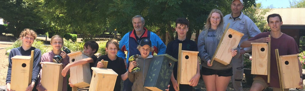 Students with home made nest boxes